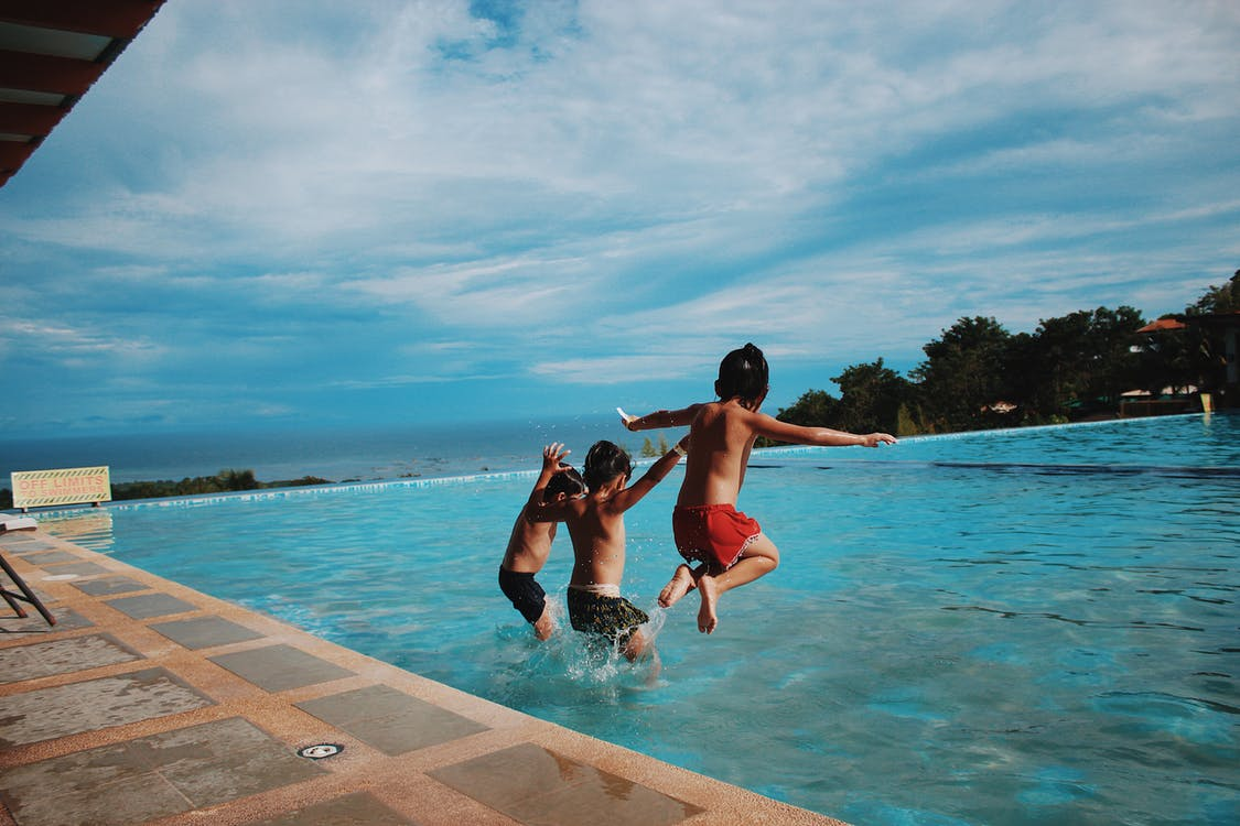 children playing the pool