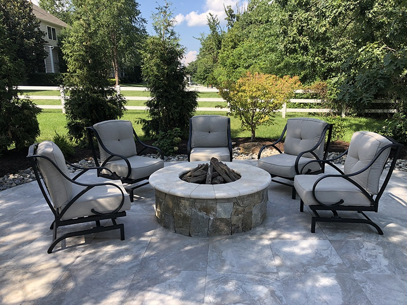 A fire pit constructed by pool builders in Sterling