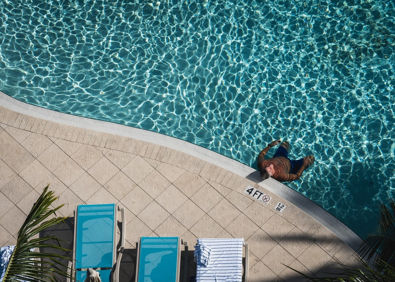 Man Resting In A Pool