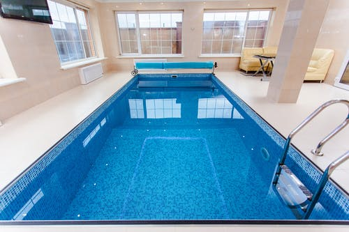 An indoor pool with a stoic minimalist design