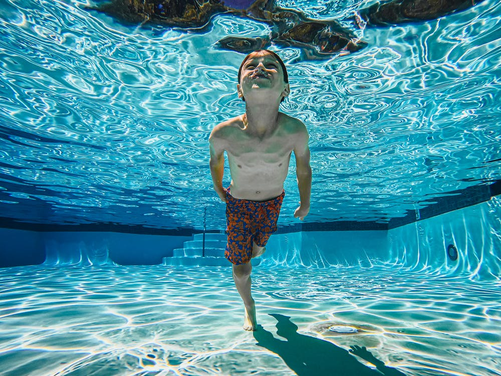 Swimming in an in-ground pool Cover Your Pool