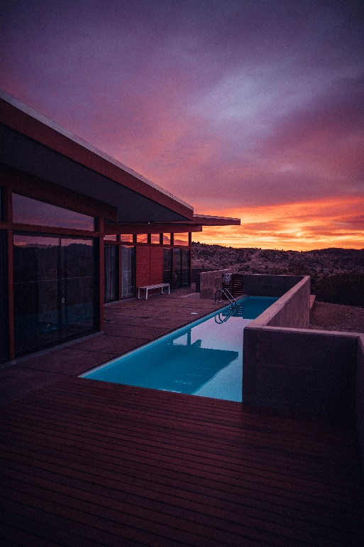 A modern swimming pool built in a small space. 