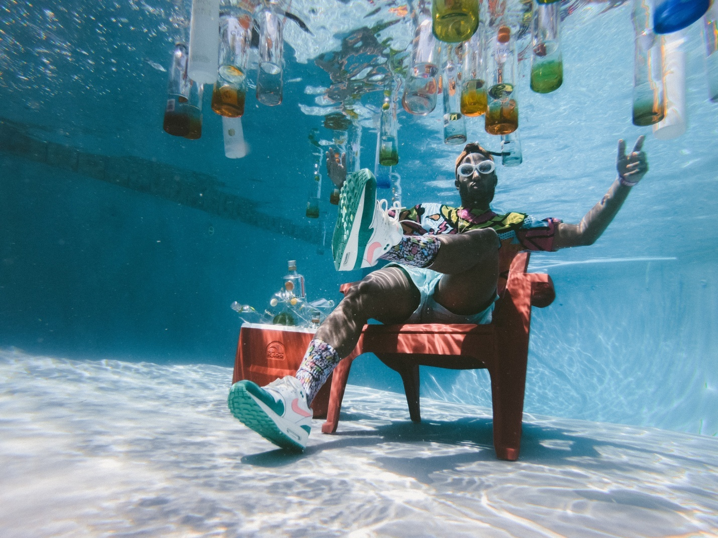 A man sitting in a pool